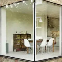 Haus mit rahmenloser Eckverglasung